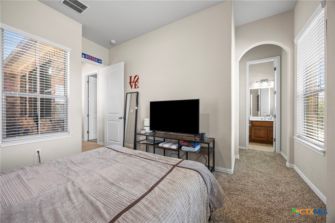 1205 Winding Way Drive Georgetown, TX 78628 - Photo 17 of 39 Another view of the third bedroom, with walk in closet and attached bath