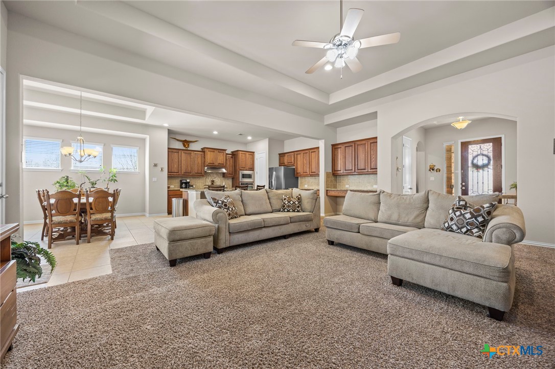 1205 Winding Way Drive Georgetown, TX 78628 - Photo 22 of 39 View from the living room looking into the kitchen and dining area.