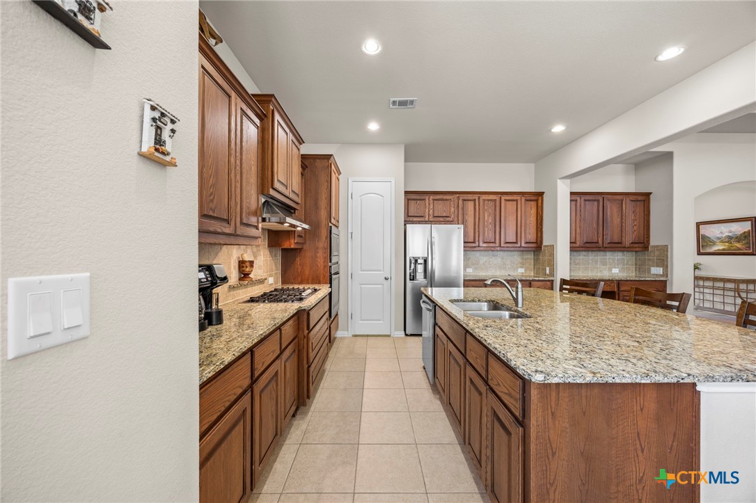 1205 Winding Way Drive Georgetown, TX 78628 - Photo 24 of 39 Tile flooring, recessed lighting, walk in pantry