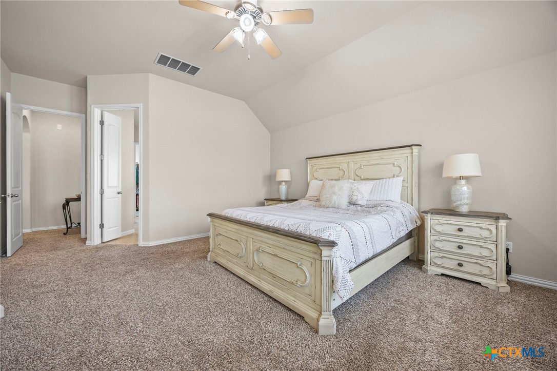 1205 Winding Way Drive Georgetown, TX 78628 - Photo 29 of 39 Another view of the bedroom and the door leading into the primary bath