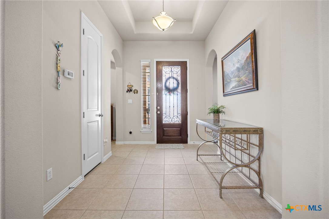 1205 Winding Way Drive Georgetown, TX 78628 - Photo 7 of 39 The tile entryway is spacious and leads to the living room.