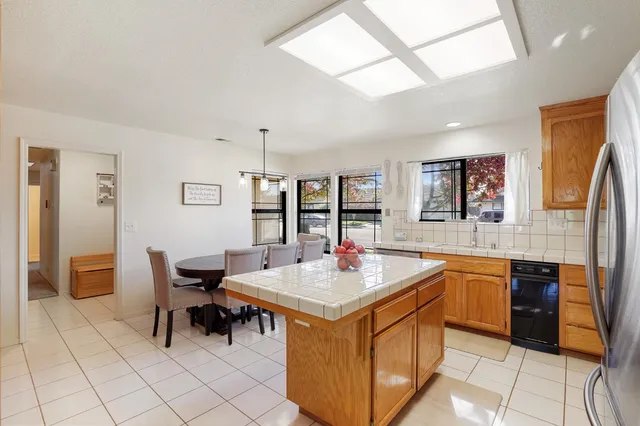 a view of a kitchen area with furniture and window