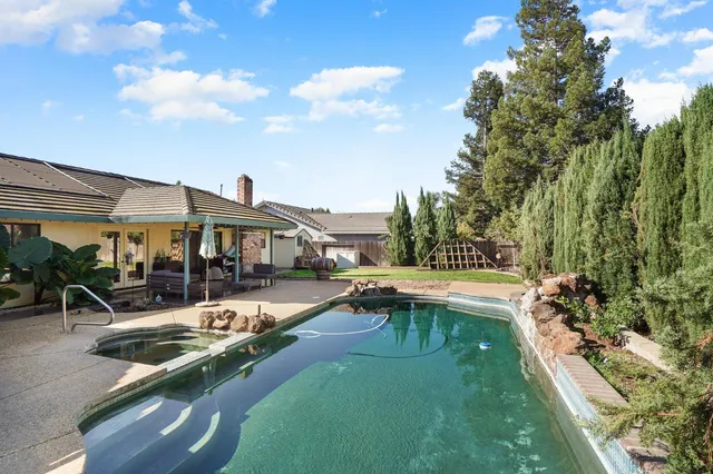 a view of house with outdoor seating space