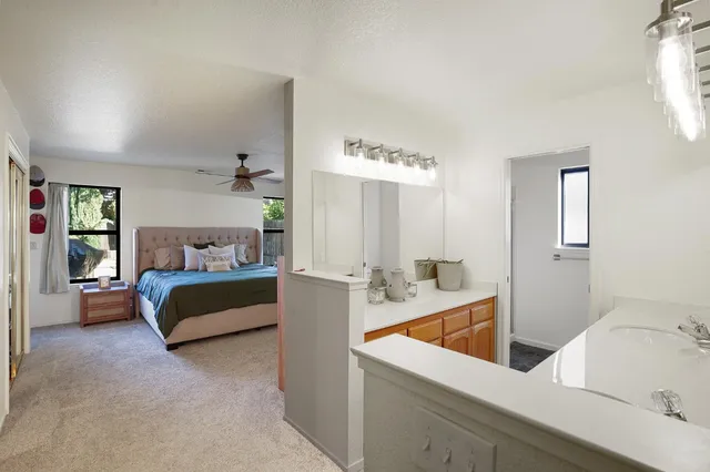 a view of living room with furniture and window