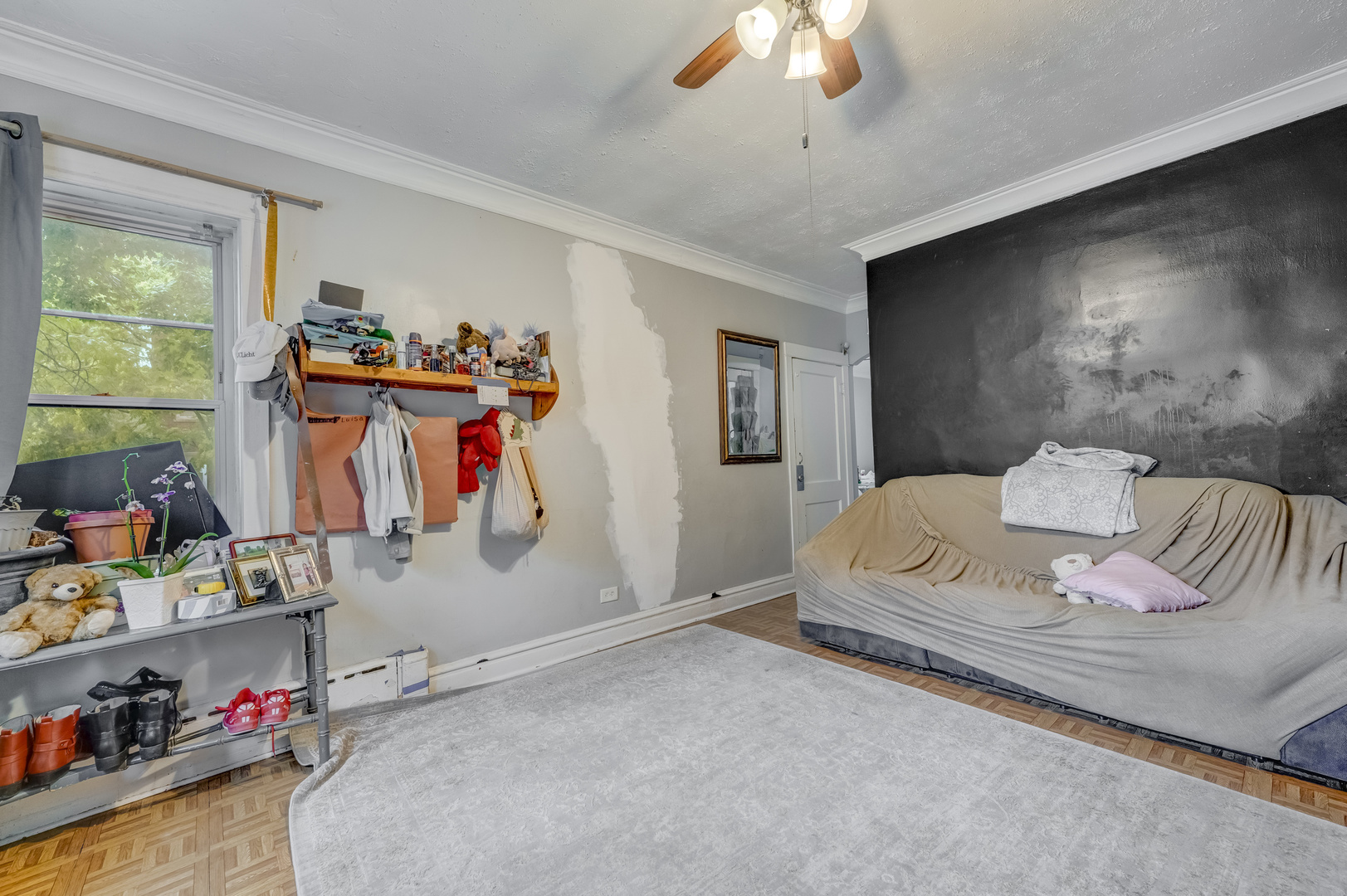 1657 North Austin Avenue Chicago, IL 60639 - Photo 20 of 36 a bedroom with bed and a window