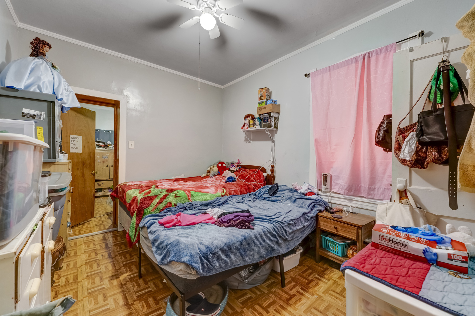 1657 North Austin Avenue Chicago, IL 60639 - Photo 23 of 36 a bedroom with a bed and a dresser