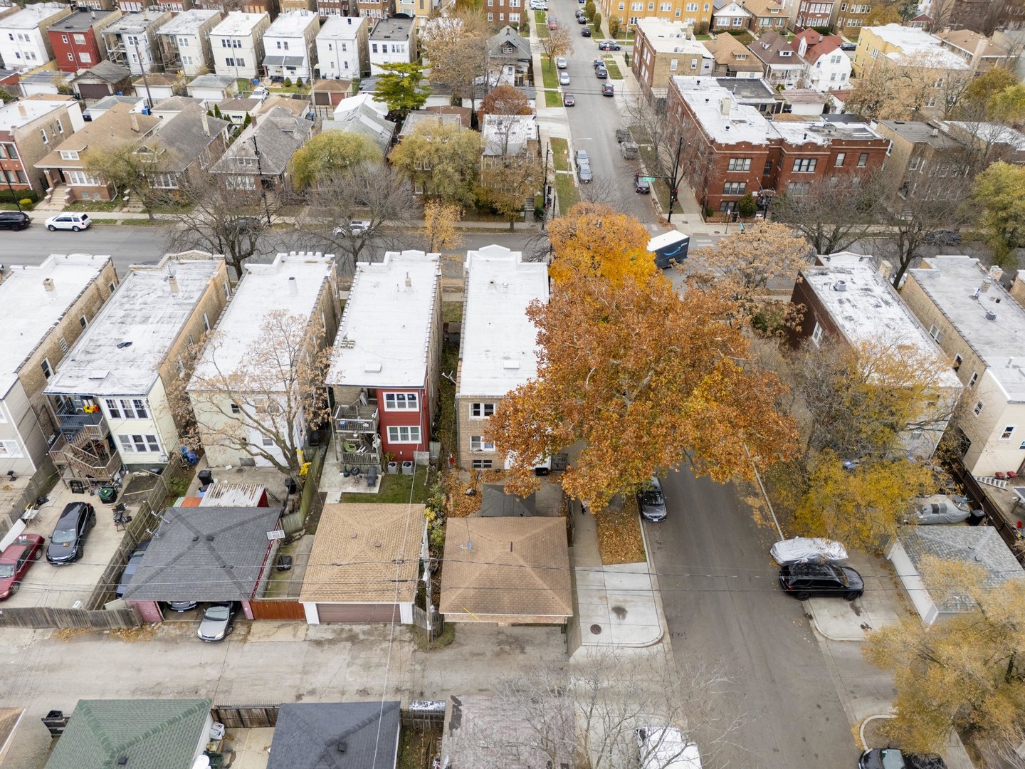 1657 North Austin Avenue Chicago, IL 60639 - Photo 35 of 36 an aerial view of residential houses with outdoor space
