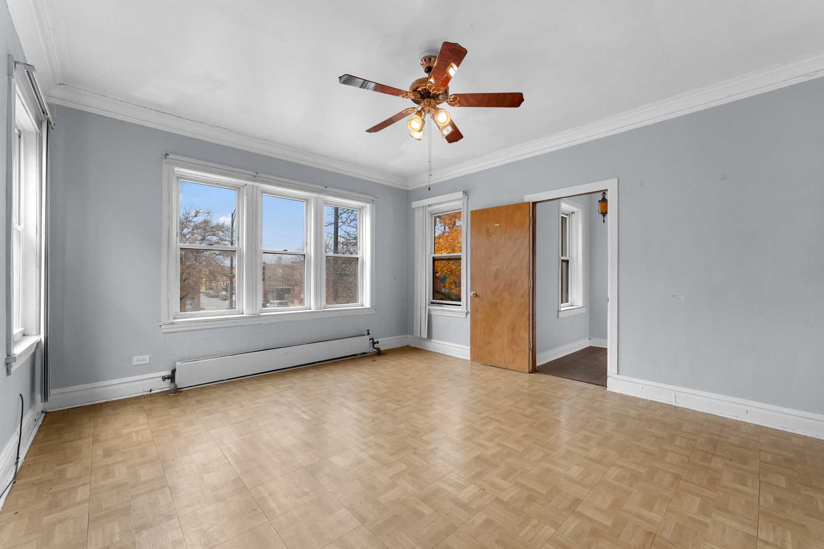 1657 North Austin Avenue Chicago, IL 60639 - Photo 4 of 36 a view of an empty room with a window