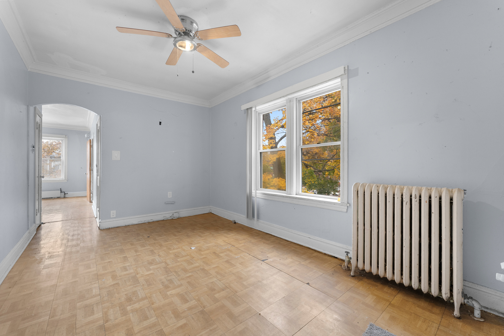 1657 North Austin Avenue Chicago, IL 60639 - Photo 9 of 36 a view of an empty room with a window
