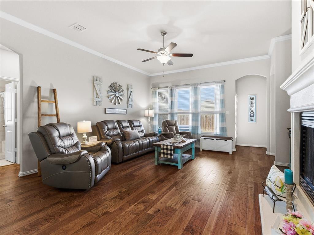 419 George Drive Fate, TX 75189 - Photo 11 of 26 a living room with furniture and a fireplace