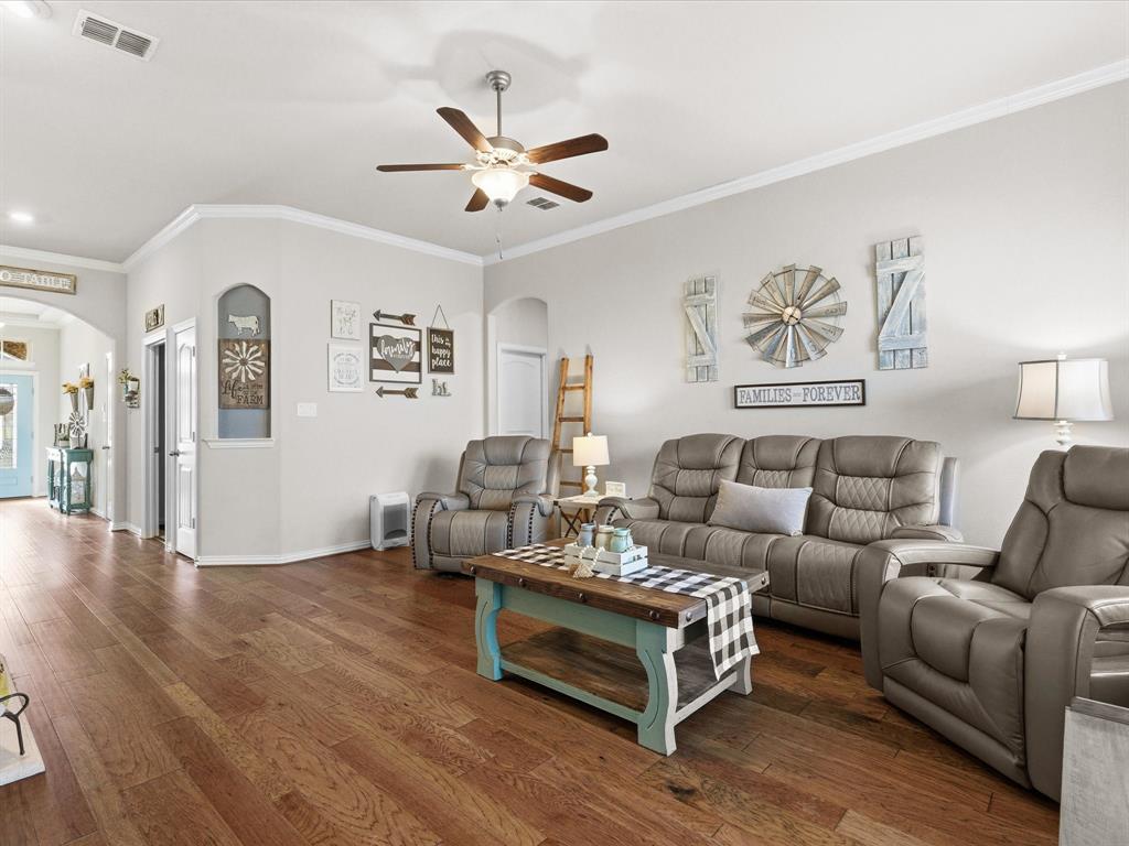 419 George Drive Fate, TX 75189 - Photo 12 of 26 a living room with furniture and wooden floor