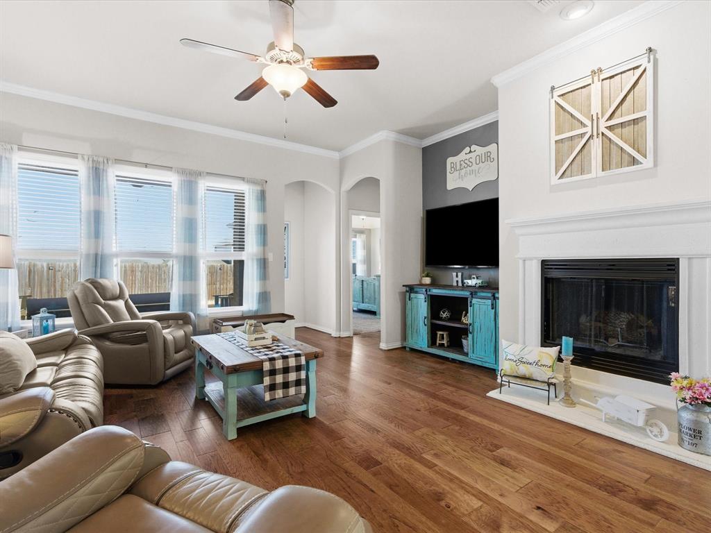419 George Drive Fate, TX 75189 - Photo 13 of 26 a living room with furniture and a fireplace