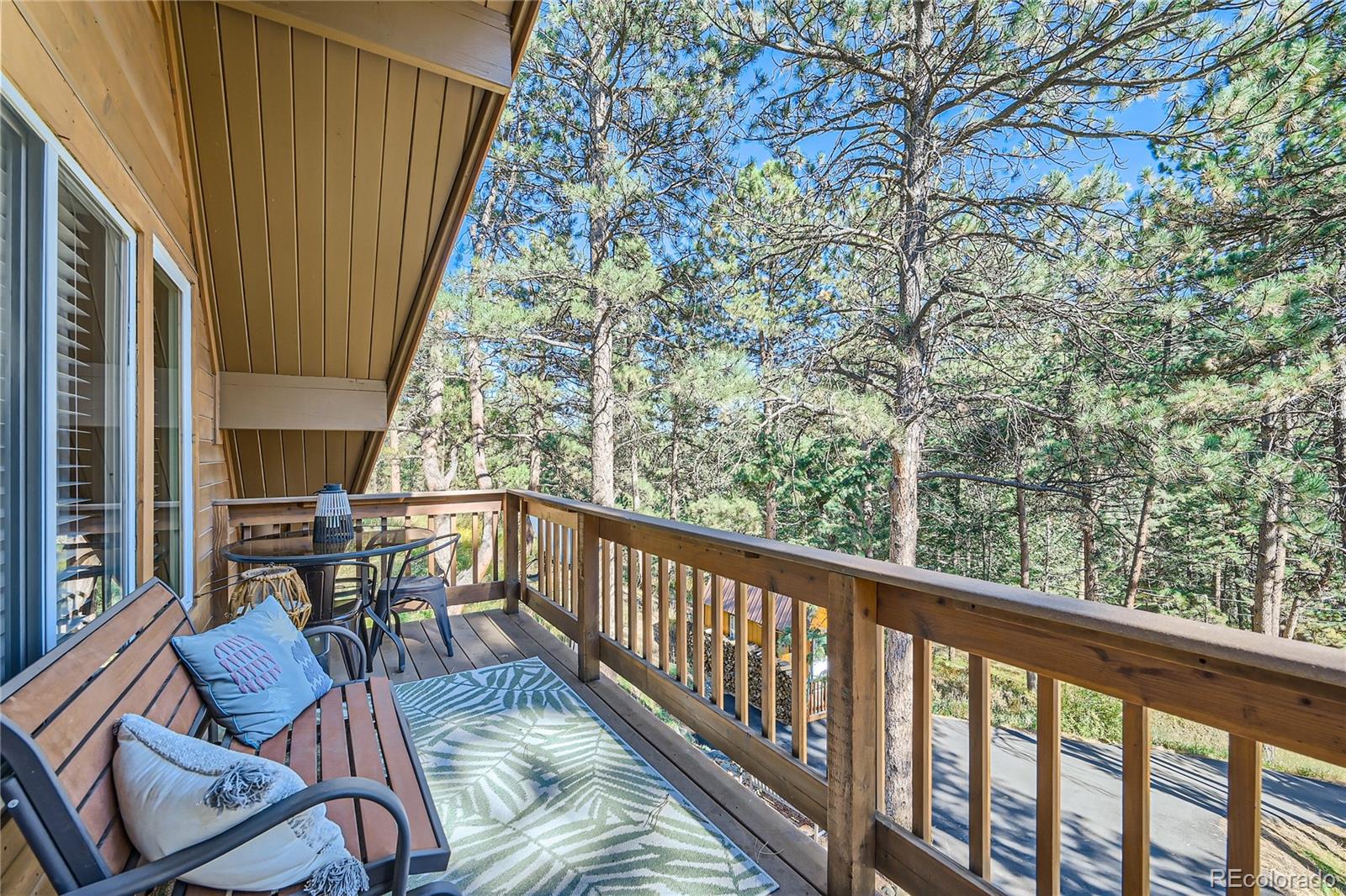 938 Valley Road Evergreen, CO 80439 - Photo 15 of 24 a view of balcony with furniture