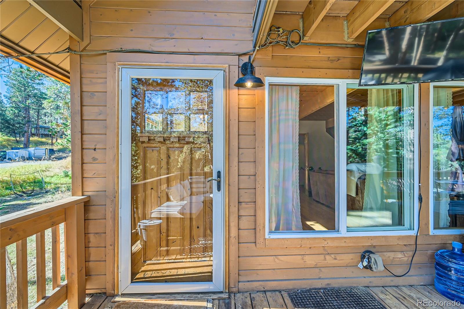 938 Valley Road Evergreen, CO 80439 - Photo 4 of 24 a view of a door and a window