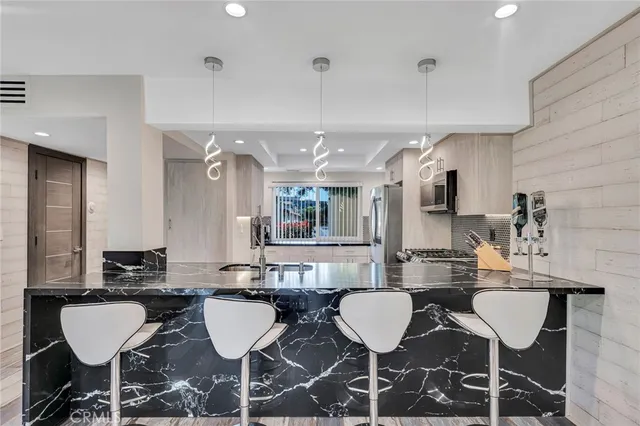 a view of a dining room with furniture