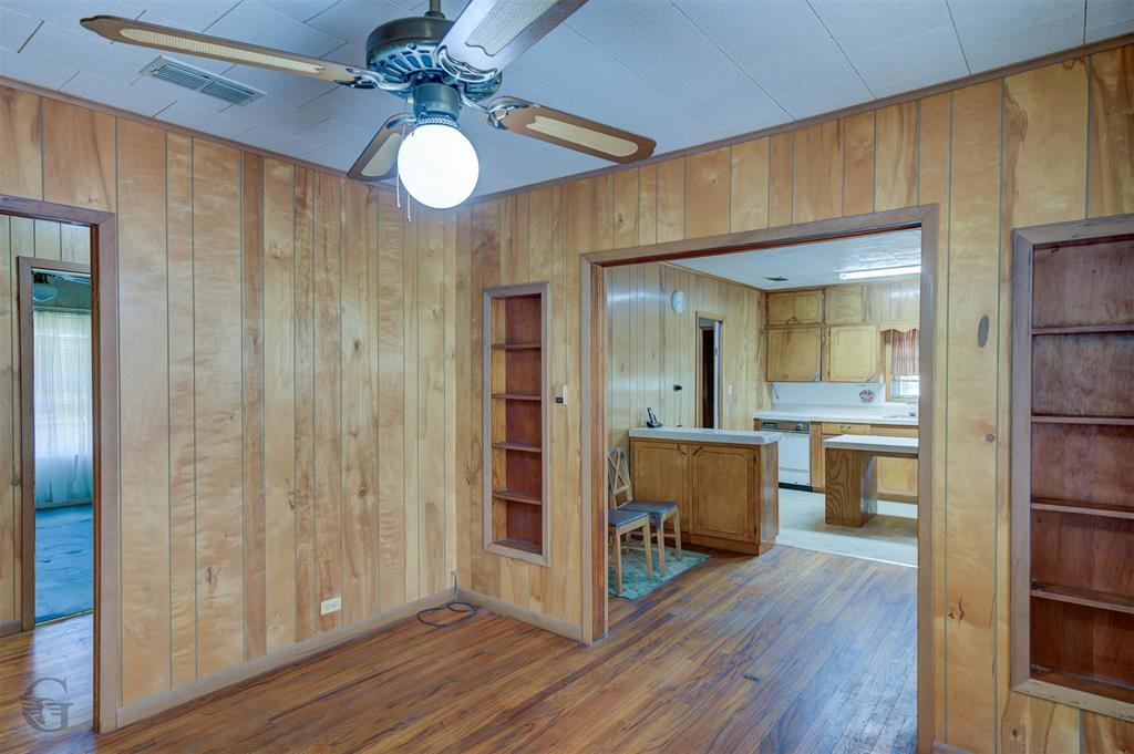 314 Dilly Road Mooringsport, LA 71060 - Photo 25 of 37 View of the kitchen from the dining. The kitchen has a cozy breakfast area