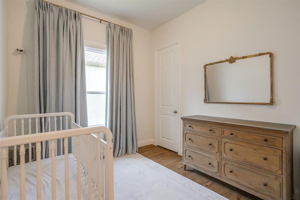 208 Observation Drive West Aledo, TX 76008 - Photo 15 of 23 a bedroom with a bed and a mirror