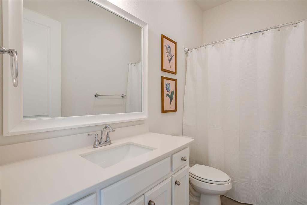 208 Observation Drive West Aledo, TX 76008 - Photo 18 of 23 a bathroom with a sink and a toilet