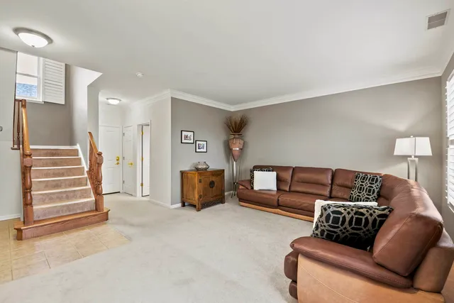 a living room with furniture and a couch