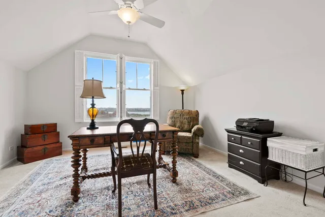 a view of a workspace with furniture