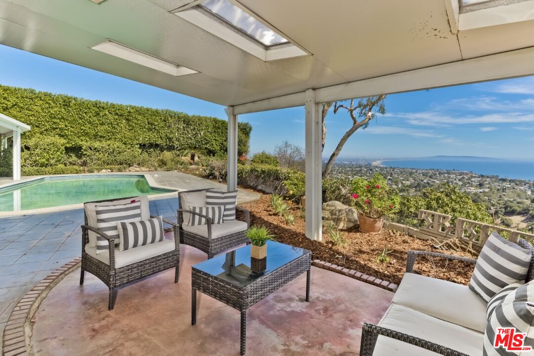 1126 Tellem Drive Pacific Palisades, CA 90272 - Photo 38 of 46 a building outdoor space with patio furniture