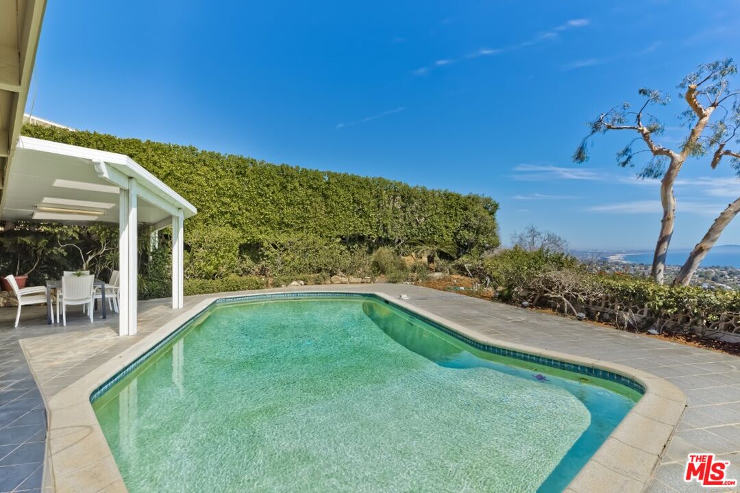 1126 Tellem Drive Pacific Palisades, CA 90272 - Photo 40 of 46 a view of a house with a yard