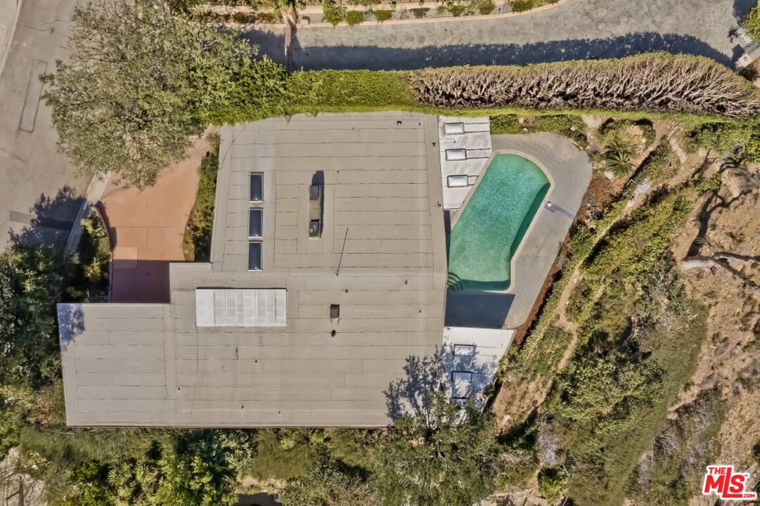 1126 Tellem Drive Pacific Palisades, CA 90272 - Photo 7 of 46 front view of a house with a door