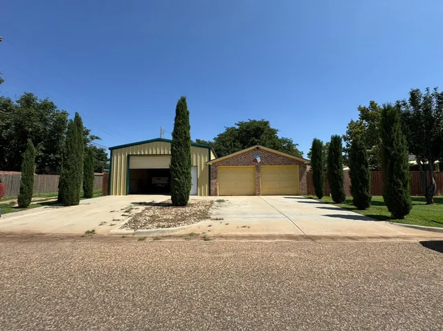 a house with trees in front of it