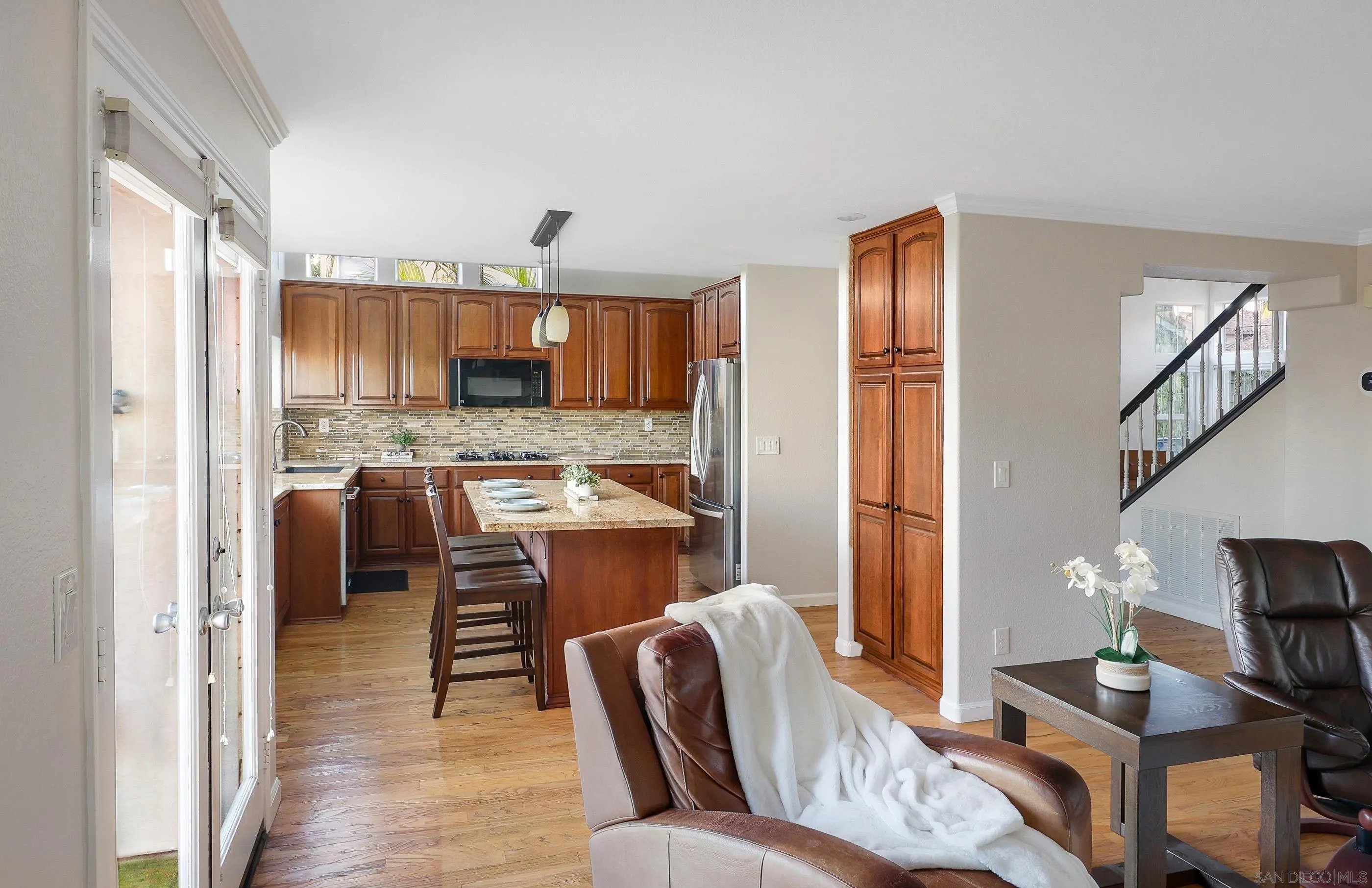 2347 Terraza Ribera Carlsbad, CA 92009 - Photo 17 of 42 a living room with furniture and a wooden floor