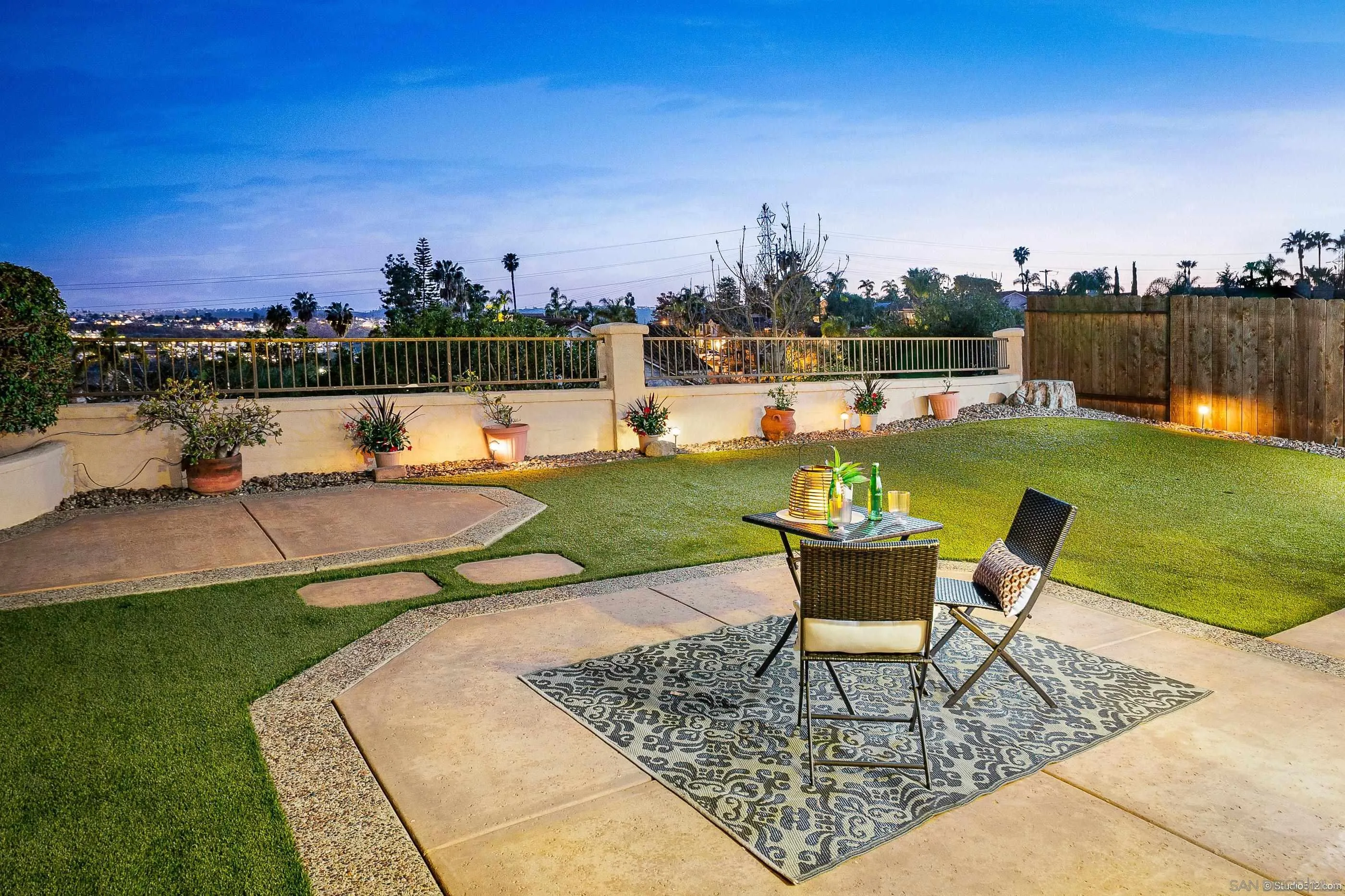2347 Terraza Ribera Carlsbad, CA 92009 - Photo 2 of 42 a view of a swimming pool and lounge chairs in back yard