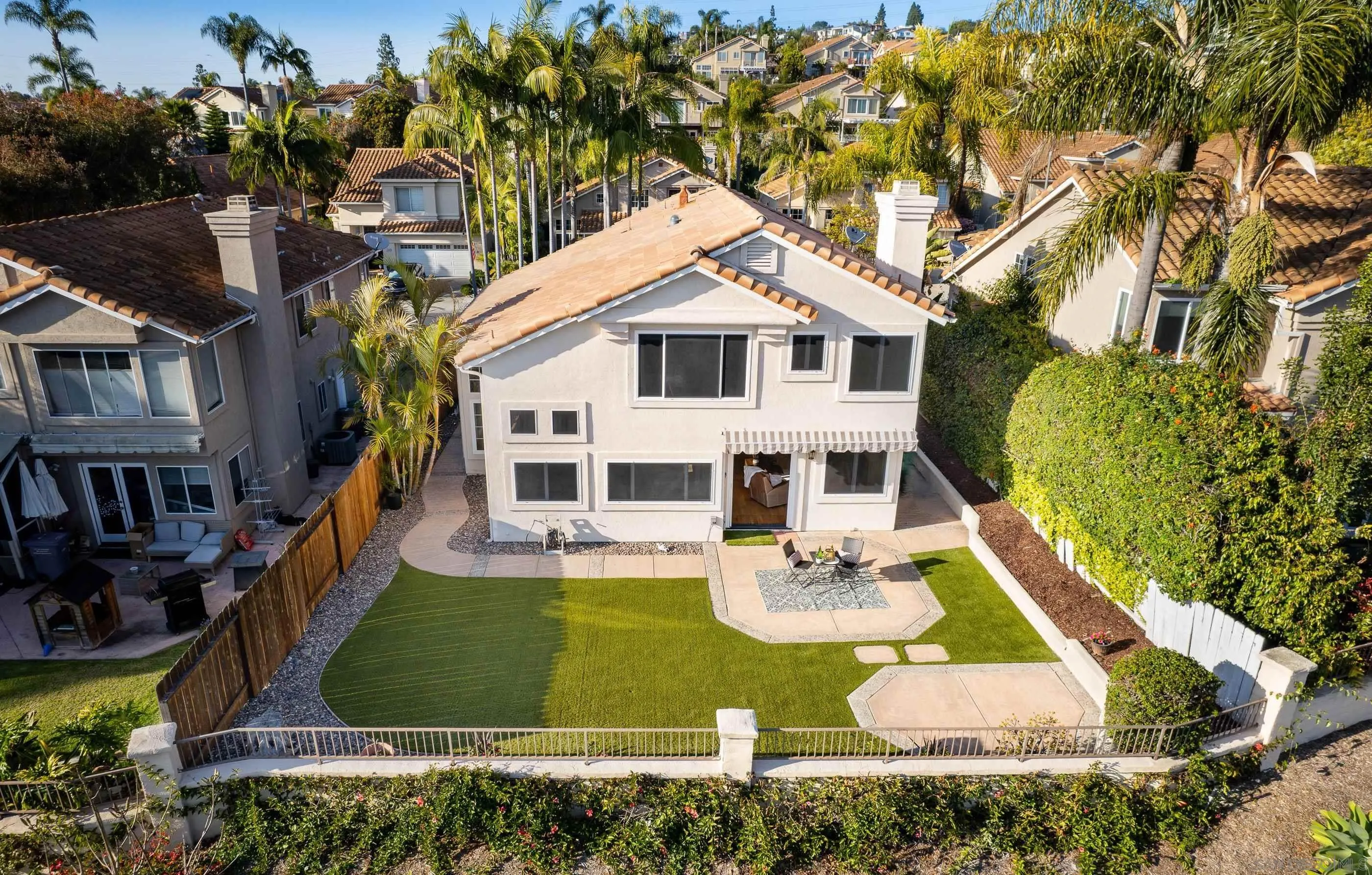 2347 Terraza Ribera Carlsbad, CA 92009 - Photo 33 of 42 a view of a house with yard and sitting area