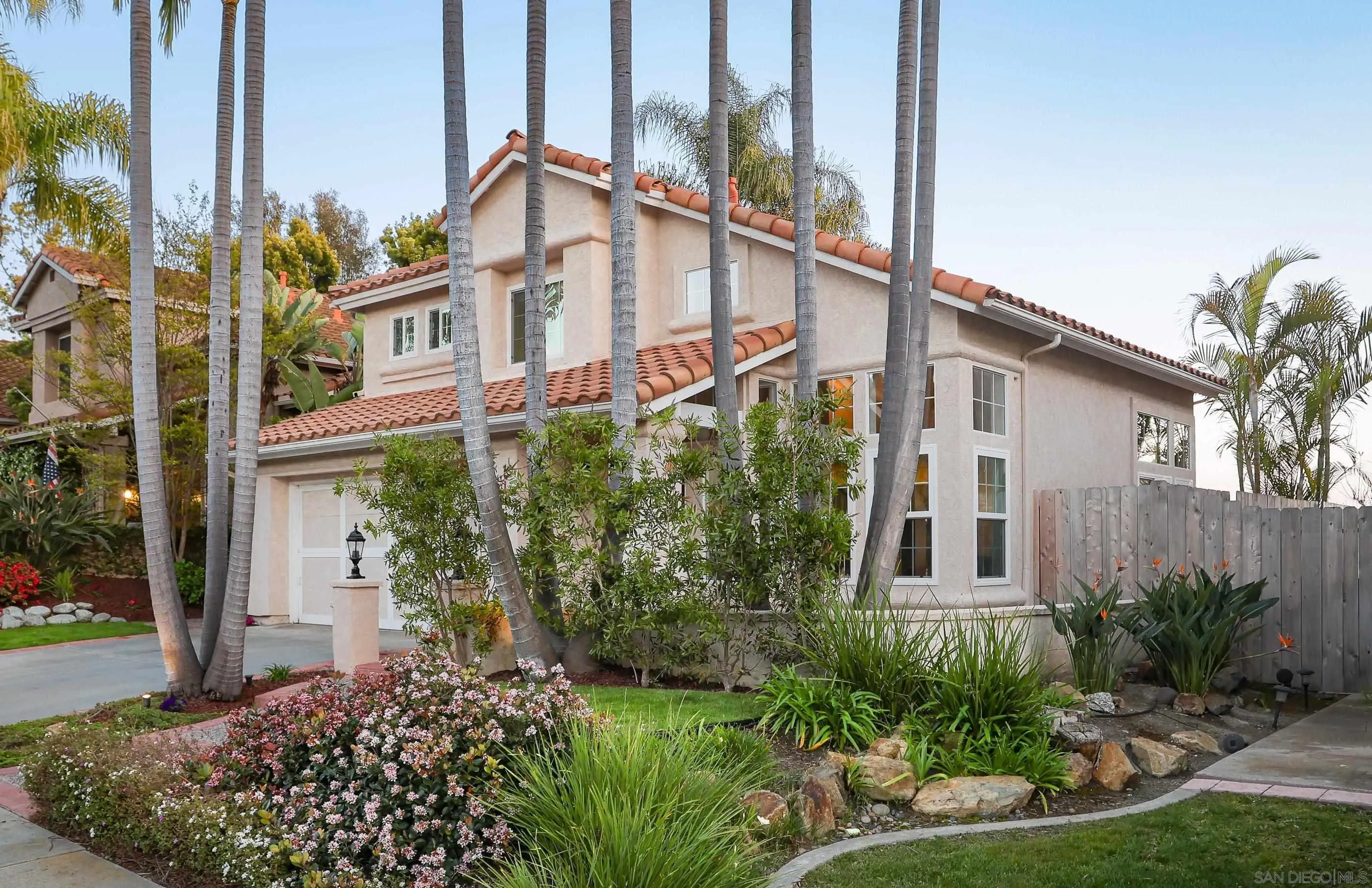 2347 Terraza Ribera Carlsbad, CA 92009 - Photo 4 of 42 front view of a house with a small yard