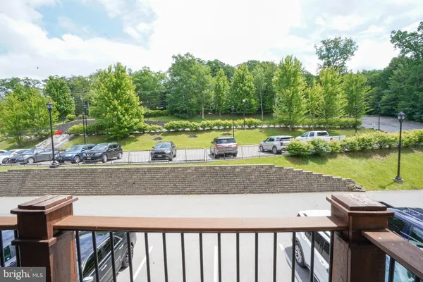 a view of a yard with an outdoor seating