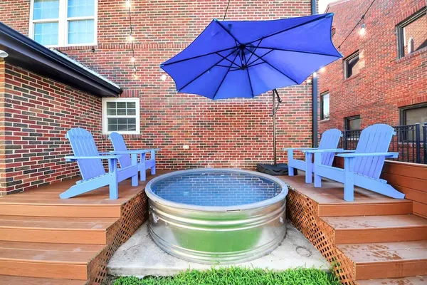 a view of an outdoor sitting area with chairs