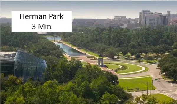 a view of a swimming pool with a garden