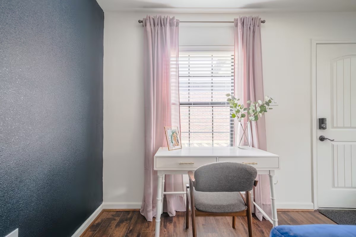 1912 Arbor Street, Unit 3 Houston, TX 77004 - Photo 2 of 24 a view of a room with a window and chair