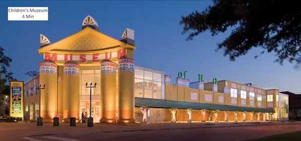 a view of a building with a small yard