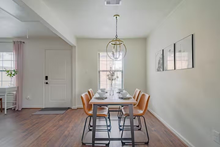 1912 Arbor Street, Unit 3 Houston, TX 77004 - Photo 6 of 24 a view of a dining room with furniture window and wooden floor