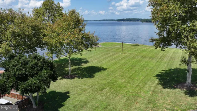 a view of outdoor space with signage and flags