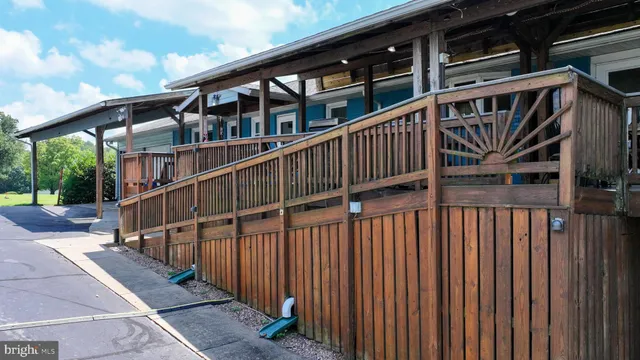 a kitchen with stainless steel appliances granite countertop a refrigerator and microwave