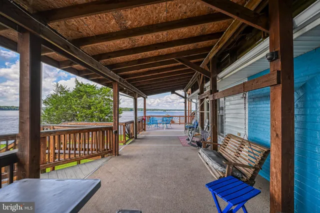 a bathroom with a sink mirror and toilet