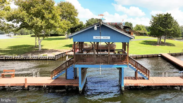 a bedroom with two beds and painted walls