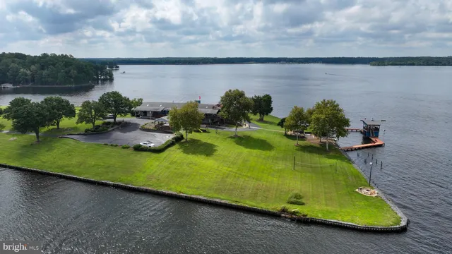 a kitchen with stainless steel appliances granite countertop a stove and cabinets
