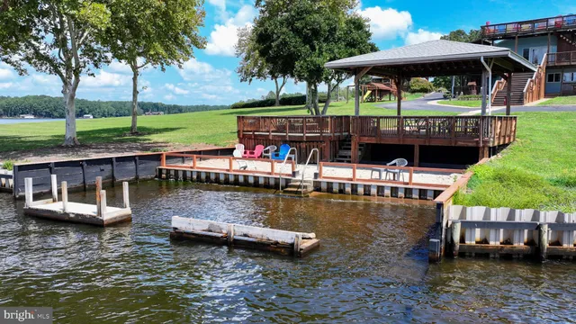 a view of a house with backyard and a slide