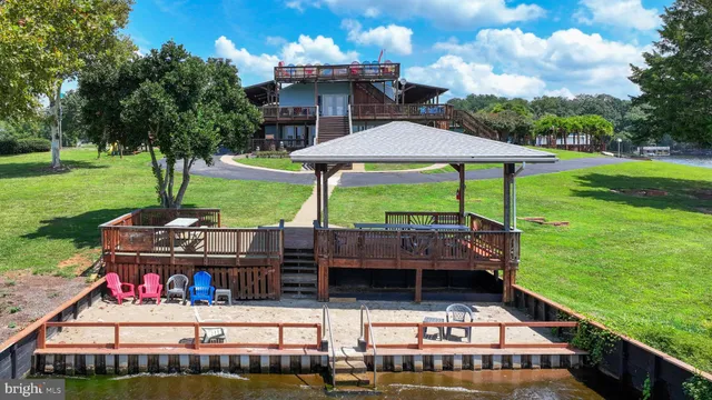 a table and chairs in the garden