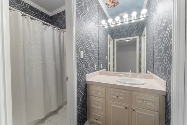 a view of a backyard with a tree