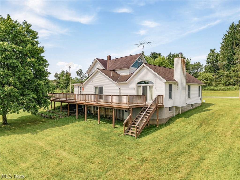 11513 Kile Road Chardon, OH 44024 - Photo 25 of 48 Expansive wooden deck with full railing and exterior staircase