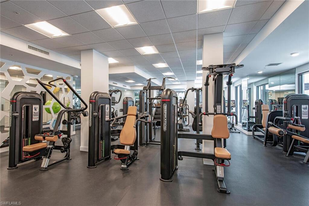 1111 Central Avenue, Unit 207 Naples, FL 34102 - Photo 15 of 18 a view of a room with gym equipment