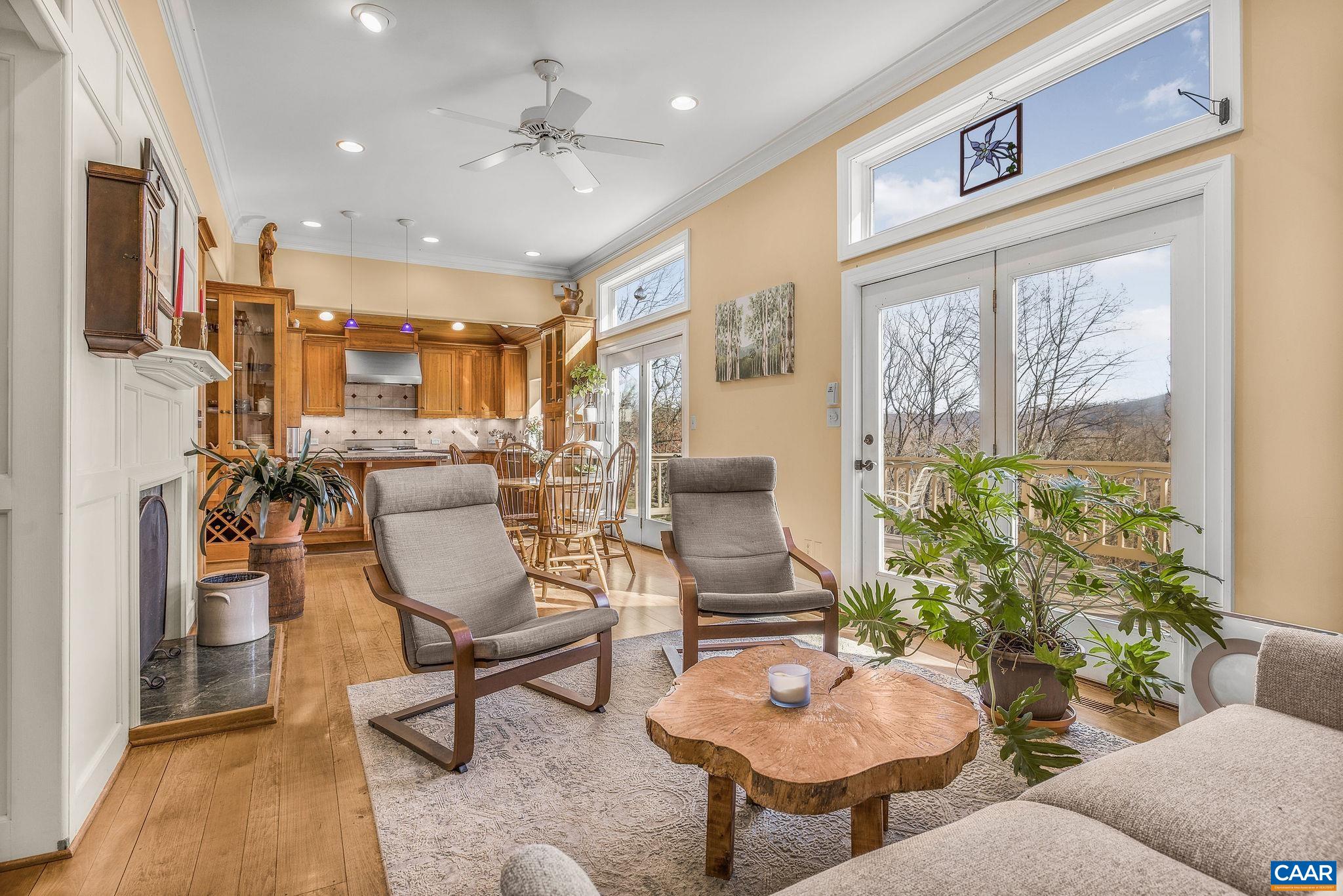 987 Rodes Farm Drive Nellysford, VA 22958 - Photo 13 of 74 a living room with furniture and a large window