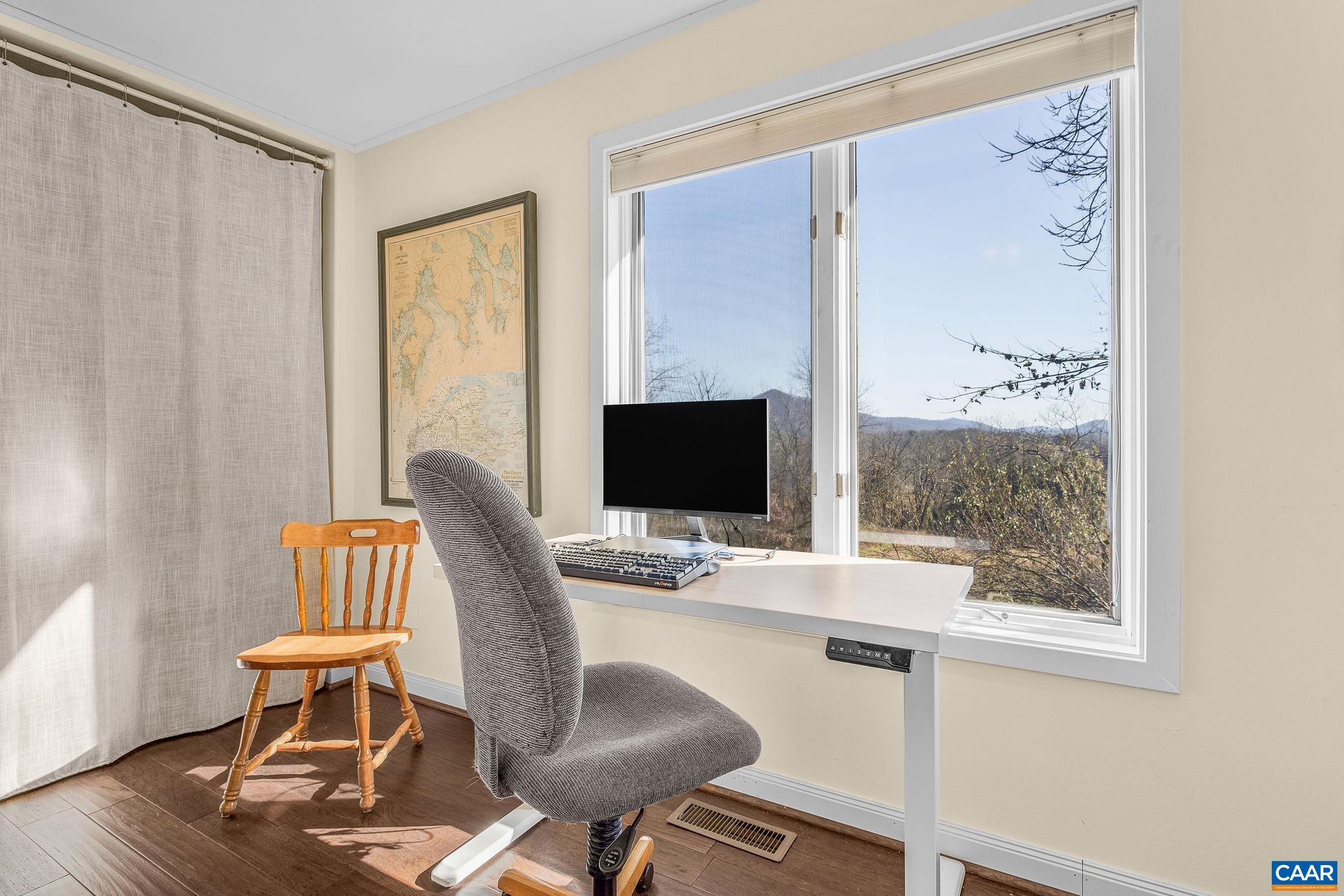 987 Rodes Farm Drive Nellysford, VA 22958 - Photo 28 of 74 a workspace with furniture and a window